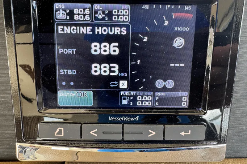 Slide: The Image of Display screen showing engine hours for 2016 Sea Ray 400 Sundancer, port: 886, starboard: 883. - 46