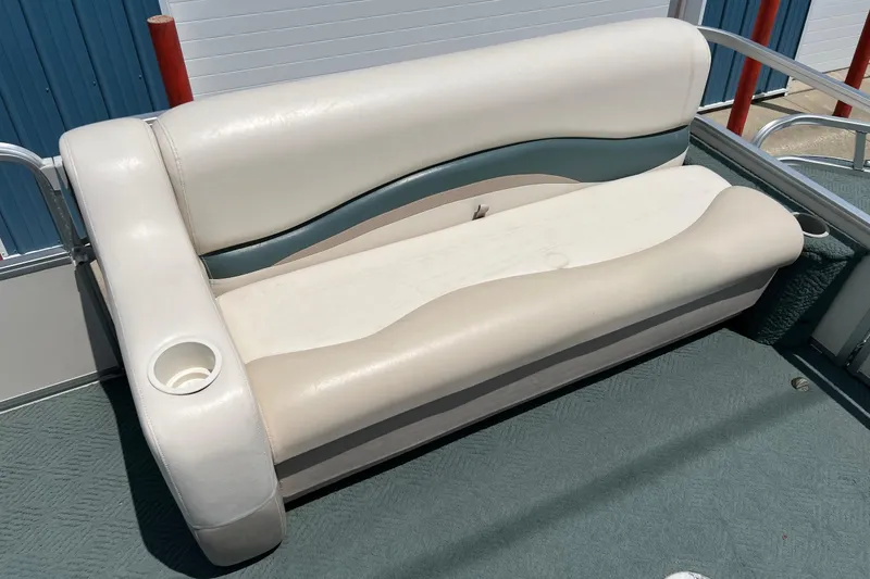 Slide: The Image of 2006 Sun Tracker Party Barge 24 seat with cup holder, beige and teal upholstery. - 14