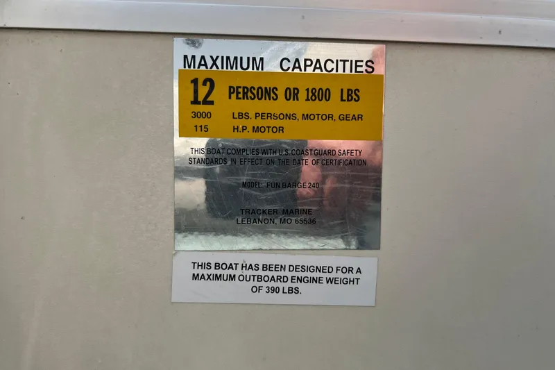 Slide: The Image of 2006 Sun Tracker Party Barge 24 capacity plate, 12 persons or 1800 lbs, 115 HP motor. - 22