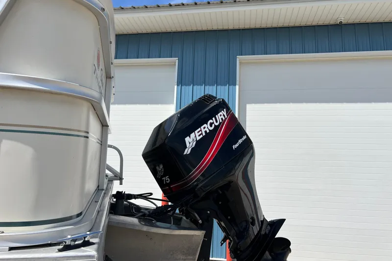 Slide: The Image of 2006 Sun Tracker Party Barge 24 with Mercury 75 FourStroke outboard motor. - 6