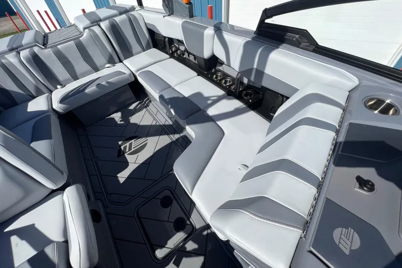 Slide: The Image of 2023 Malibu Wakesetter 22 LSV interior with sleek gray seating and modern design. - 19