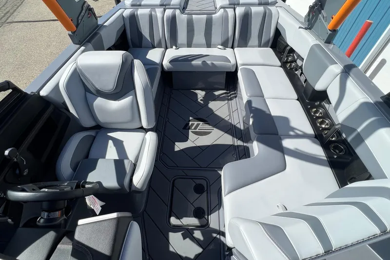 Slide: The Image of 2023 Malibu Wakesetter 22 LSV interior with luxurious seating and modern design. - 26