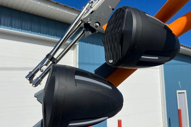 Slide: The Image of 2023 Malibu Wakesetter 22 LSV boat speakers mounted on orange tower. - 30