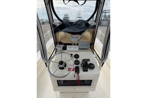 Slide: The Image of 2001 Parker 2100 Special Edition boat helm with steering wheel and controls. - 6