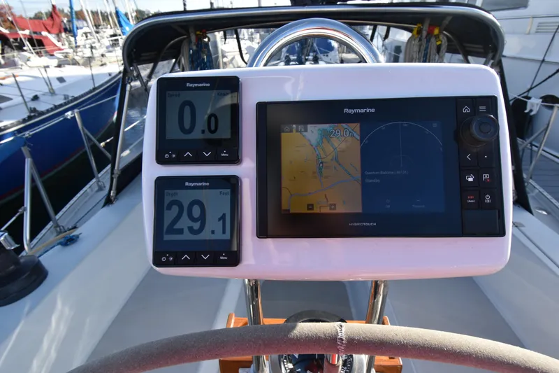 Slide: The Image of Cockpit of 1988 Ericson 38-200 sailboat with Raymarine navigation displays. - 44