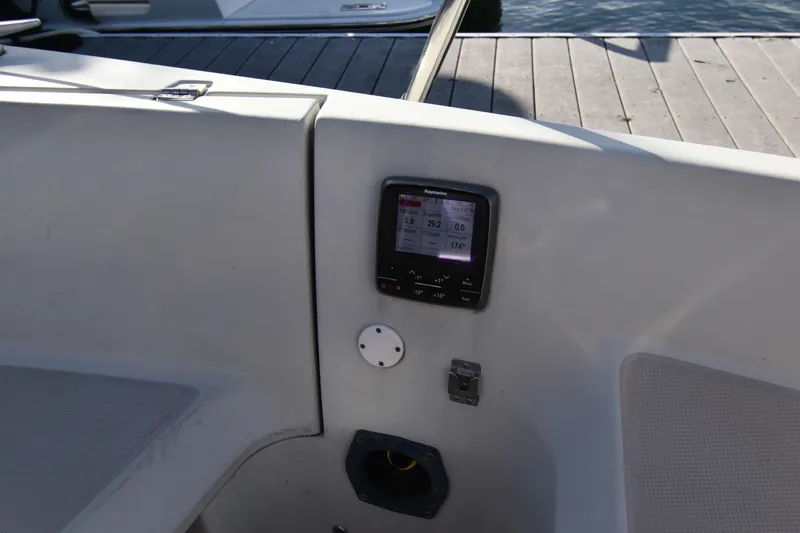 Slide: The Image of Cockpit of 1988 Ericson 38-200 sailboat with navigation display. - 45