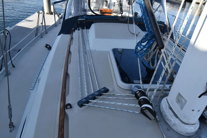 Slide: The Image of 1988 Ericson 38-200 sailboat deck with rigging and ropes. - 58