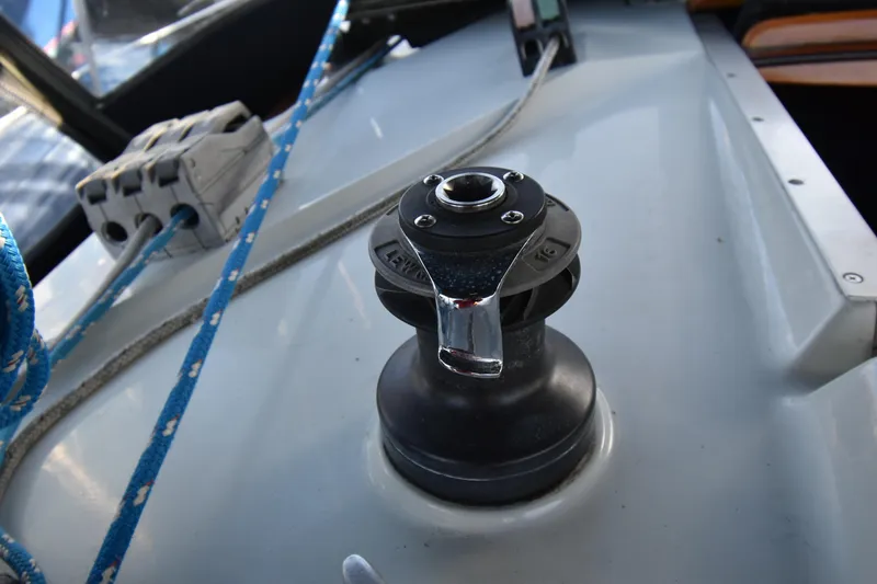 Slide: The Image of Winch and ropes on 1988 Ericson 38-200 sailboat deck. - 70