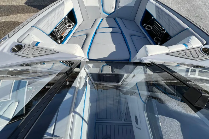 Slide: The Image of 2020 Super Air Nautique G21 boat interior with sleek seating and modern design. - 24