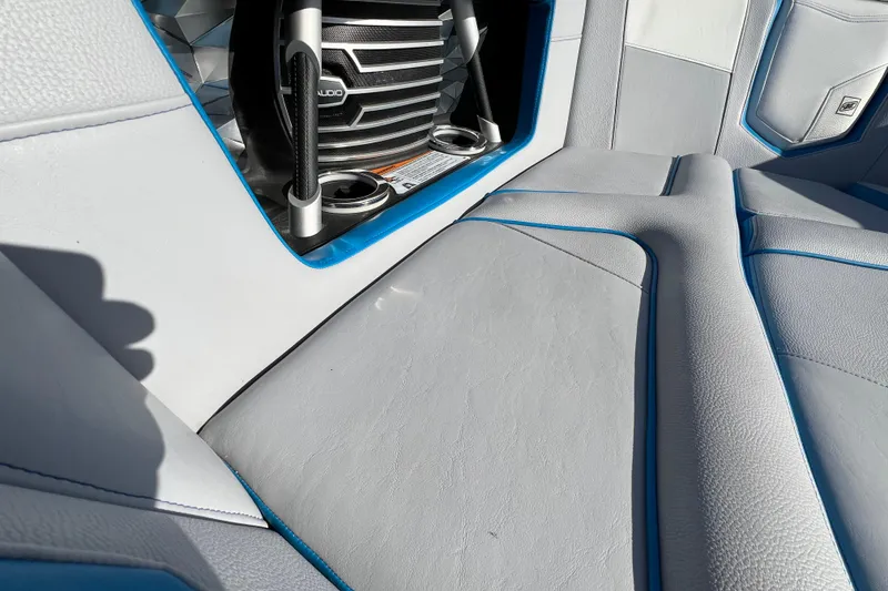 Slide: The Image of 2020 Super Air Nautique G21 interior with premium upholstery and audio system. - 26