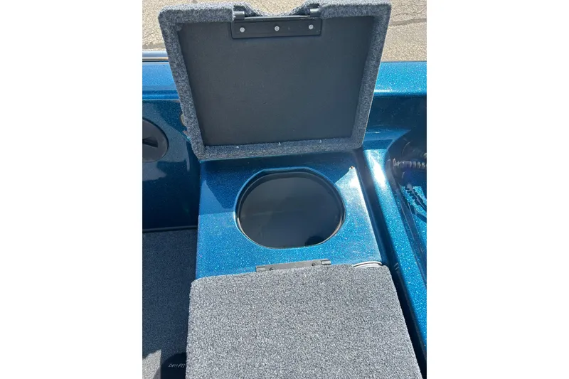 Slide: The Image of 2005 Skeeter WX1880 DC boat interior with blue and gray seating. - 21