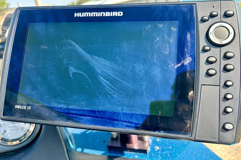 Slide: The Image of Open storage compartment on 2005 Skeeter WX1880 DC boat, showing interior details. - 22