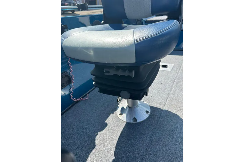 Slide: The Image of Open storage compartment in 2005 Skeeter WX1880 DC boat, featuring carpeted interior. - 23