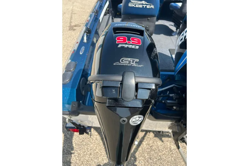 Slide: The Image of 2005 Skeeter WX1880 DC boat with Mercury 9.9 Pro outboard motor. - 3