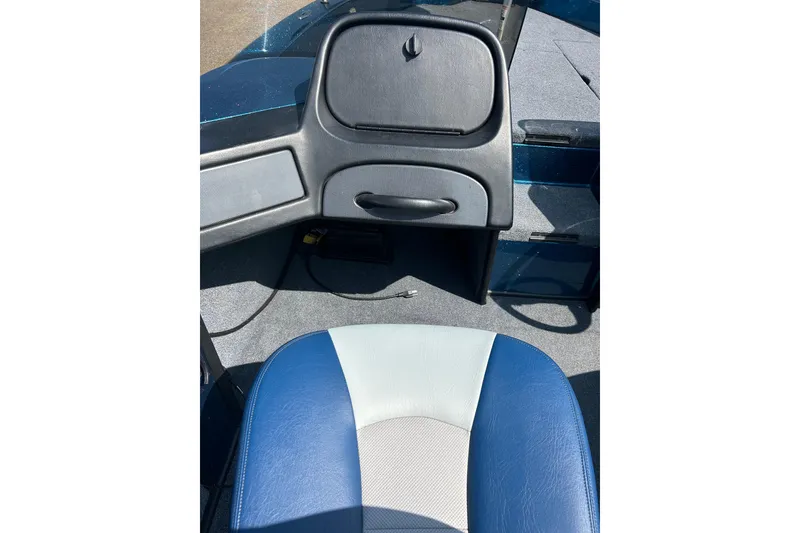 Slide: The Image of 2005 Skeeter WX1880 DC boat interior with dual blue and gray seats. - 9