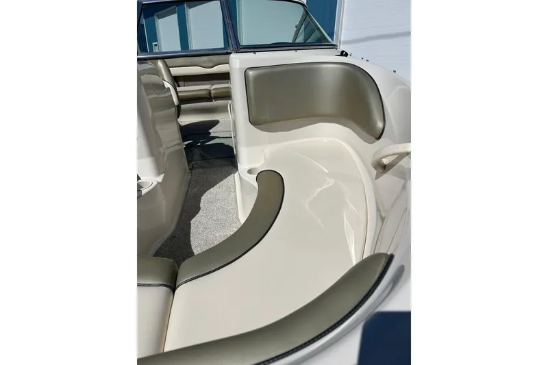 Slide: The Image of Interior view of 2005 Sea Ray 200 Sport boat, featuring sleek seating and modern design. - 5