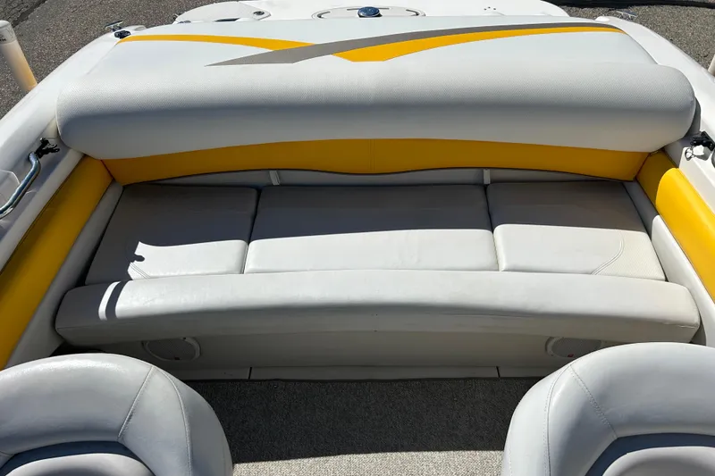 Slide: The Image of 2007 Larson SEi 180 LX I/O boat interior with yellow and gray seating. - 13