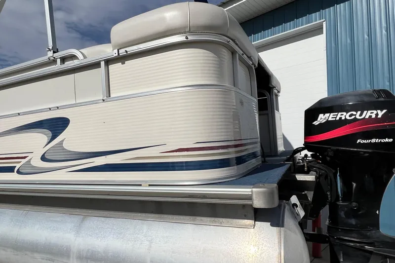 Slide: The Image of 2003 Sylvan 824 Mirage Cruise pontoon boat with Mercury FourStroke engine. - 24