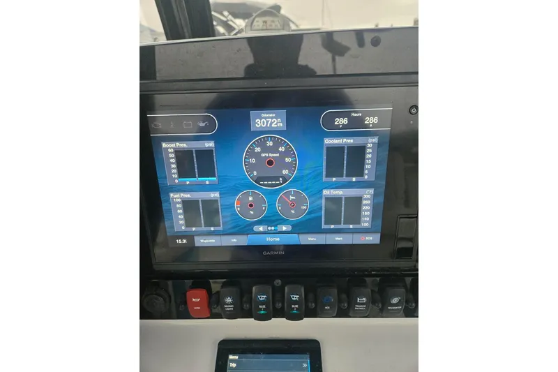Slide: The Image of Garmin display on 2021 Sea Hunt Gamefish 25 showing engine metrics and odometer reading. - 15