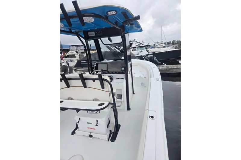 Slide: The Image of 2021 Sea Hunt Gamefish 25 boat docked, featuring a sleek design and modern equipment. - 26