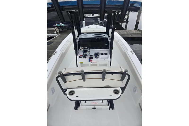 Slide: The Image of 2021 Sea Hunt Gamefish 25 boat interior with steering console and seating. - 27