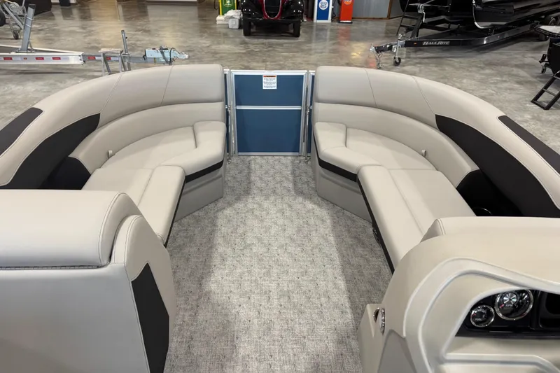 Slide: The Image of 2026 Berkshire 24 RFX LE pontoon boat interior with luxurious seating and modern design. - 11