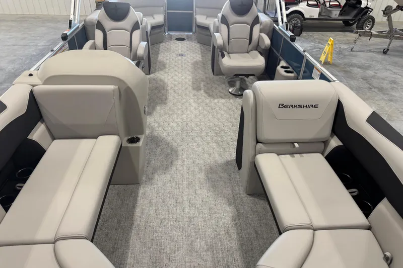 Slide: The Image of 2026 Berkshire 24 RFX LE pontoon boat interior with luxurious seating and modern design. - 12