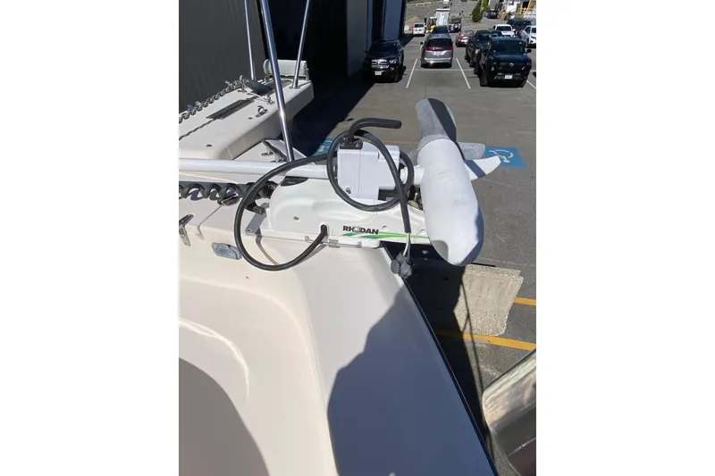 Slide: The Image of 2017 Grady-White Marlin 300 boat with mounted equipment in a parking lot. - 26