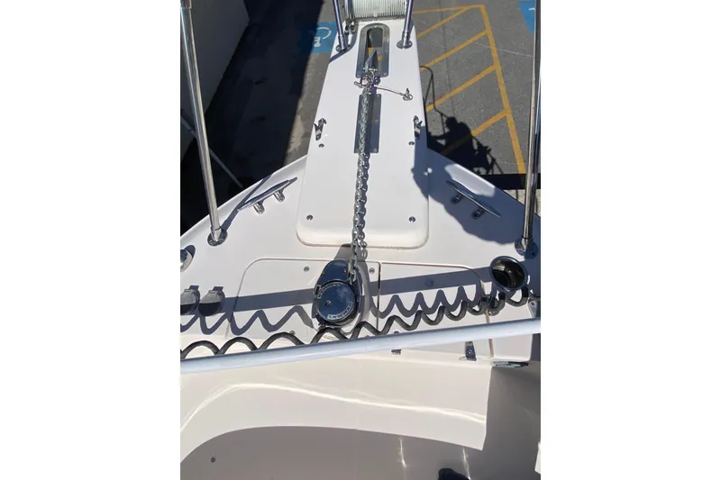 Slide: The Image of 2017 Grady-White Marlin 300 boat deck with anchor chain and railing. - 27