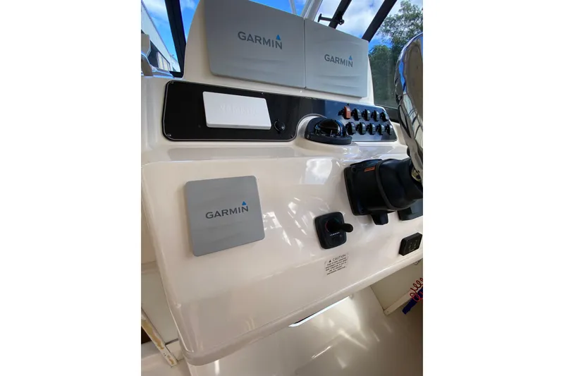 Slide: The Image of 2017 Grady-White Marlin 300 helm with Garmin navigation equipment. - 8