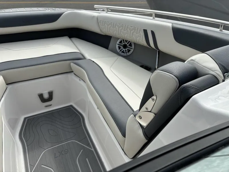 Slide: The Image of Luxurious interior of 2025 Regal LX9 boat with stylish seating and modern design. - 10