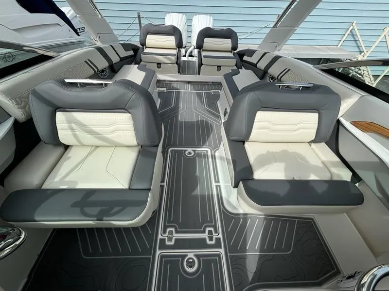 Slide: The Image of Luxurious interior of 2025 Regal LX9 boat with modern seating and sleek design. - 14