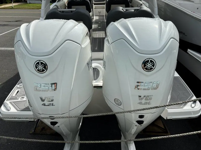 Slide: The Image of Twin Yamaha 250 V6 4.2L outboard engines on a 2025 Regal LX9 boat. - 17