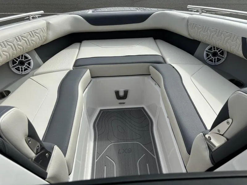 Slide: The Image of Luxurious interior of 2025 Regal LX9 boat with stylish seating and modern design. - 8
