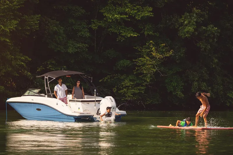 Slide: The Image of 2023 Sea Ray SPX 230 Outboard interior with sleek seating and modern design. - 3