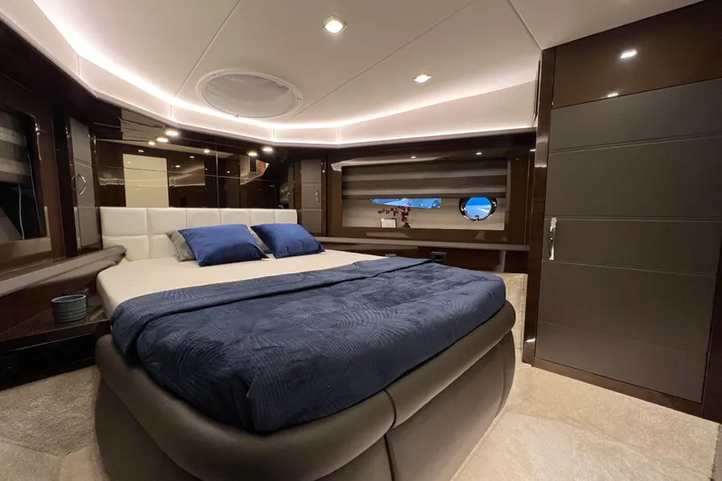 Slide: The Image of Luxurious bedroom interior of 2026 Cobrey 52 FLY yacht with modern design. - 15