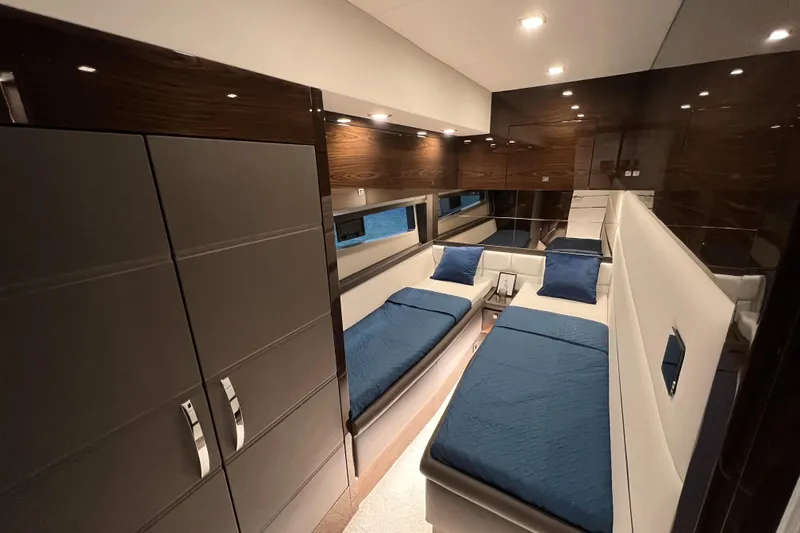 Slide: The Image of Luxurious interior of 2026 Cobrey 52 FLY yacht with twin beds and modern design. - 17