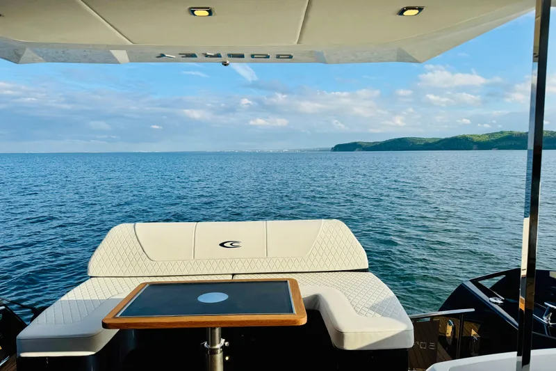 Slide: The Image of Luxurious Cobrey 52 FLY yacht interior with ocean view, 2026 model. - 7