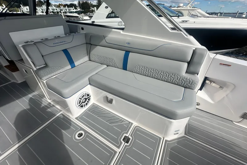 Slide: The Image of Luxurious seating on 2025 Regal LX36 boat, featuring modern design and premium materials. - 16