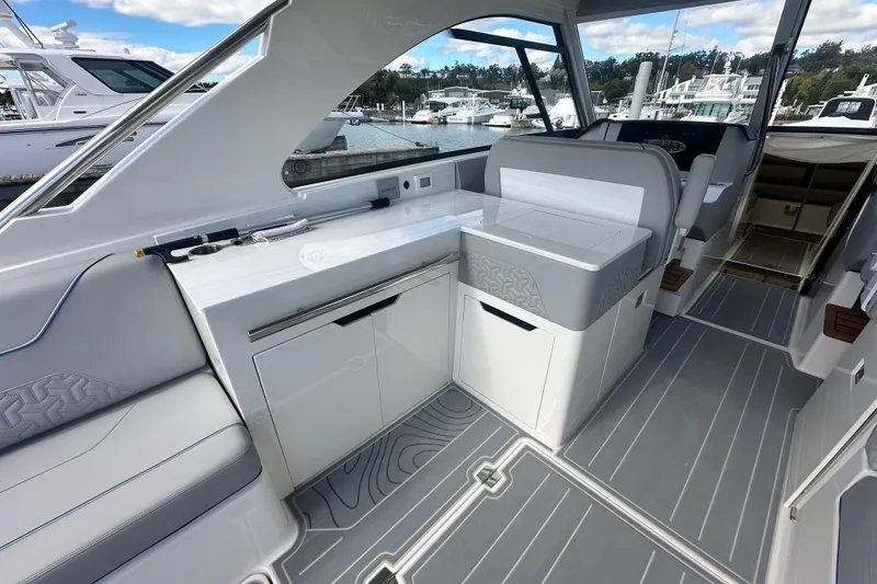 Slide: The Image of 2025 Regal LX36 yacht interior with sleek design, modern amenities, and spacious seating. - 21