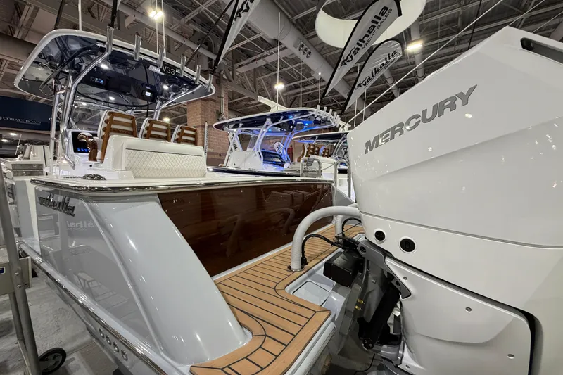 Slide: The Image of 2026 Valhalla Boatworks V-33 with Mercury engine, showcased indoors. - 15