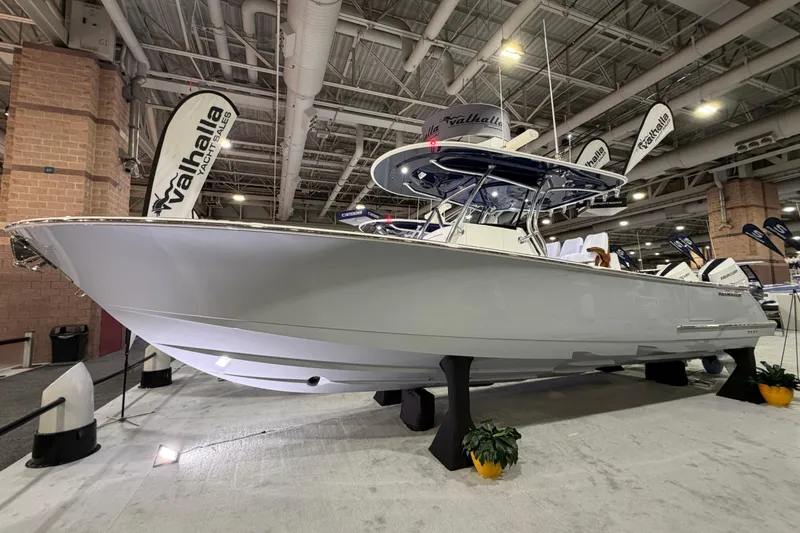 The Image of 2026 Valhalla Boatworks V-33 displayed indoors at a boat show. - 2