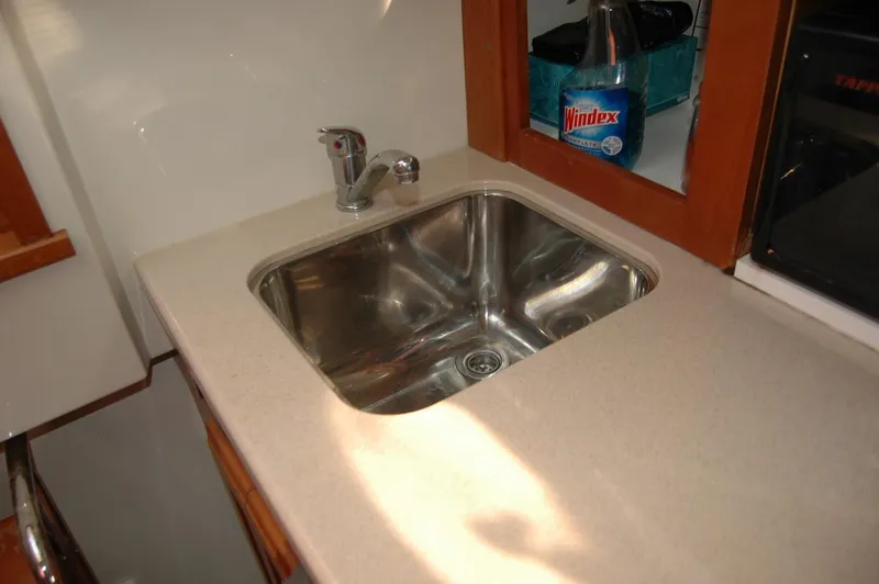 Slide: The Image of Stainless steel sink in 2006 Back Cove 26 boat kitchen area. - 13