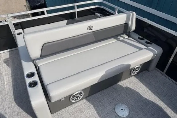 Slide: The Image of 2026 Sun Tracker Party Barge 22 RF DLX with comfortable seating and cup holders. - 20