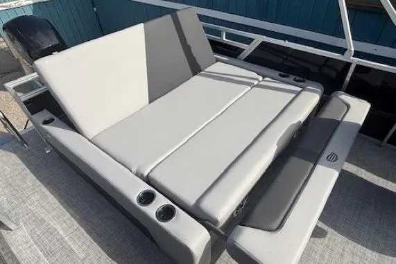 Slide: The Image of 2026 Sun Tracker Party Barge 22 RF DLX with spacious seating and cup holders. - 28