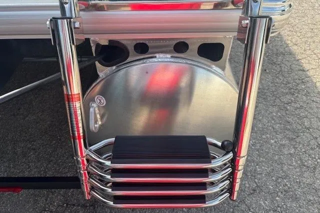 Slide: The Image of Rear view of 2026 Sun Tracker Party Barge 22 RF DLX ladder and pontoon. - 31