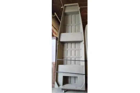 The Image of 2026 Tracker Grizzly 10 Jon boat, vertical view, showcasing interior design and structure. - 0