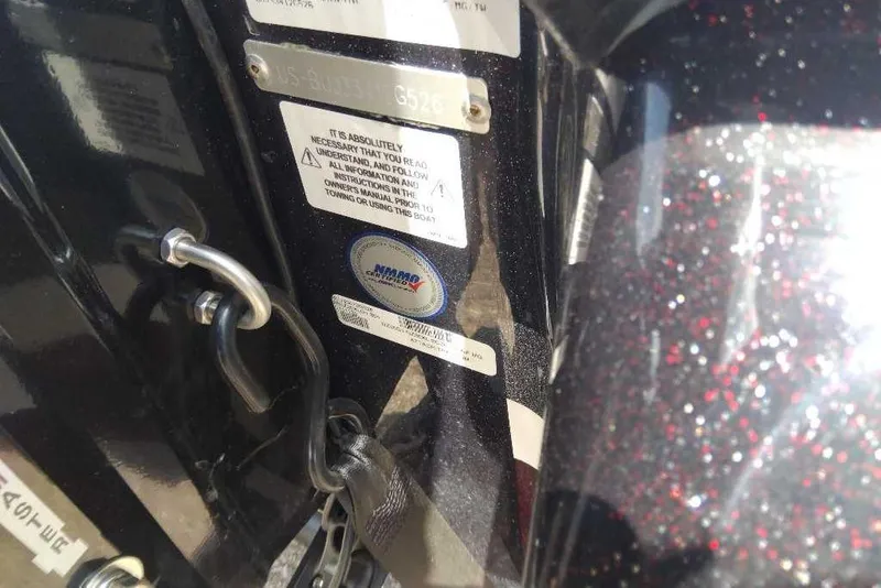 Slide: The Image of Close-up of Nitro Z20 XL Pro 2026 boat identification and safety labels. - 11