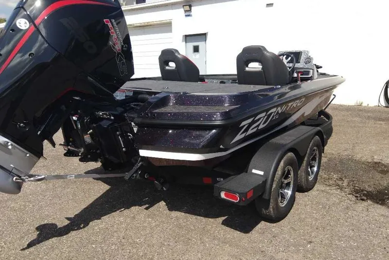Slide: The Image of 2026 Nitro Z20 XL Pro boat with powerful engine and sleek design on a trailer. - 9