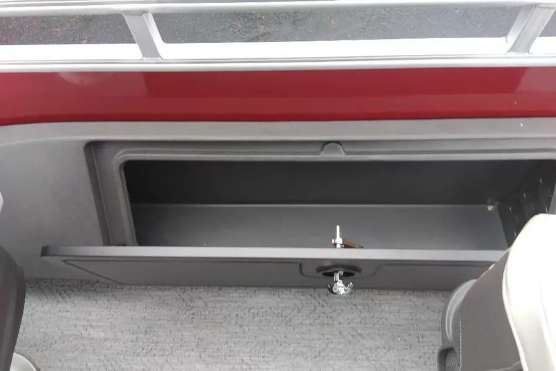 Slide: The Image of Storage compartment on a 2026 Sun Tracker Fishin' Barge 22 DLX pontoon boat. - 71